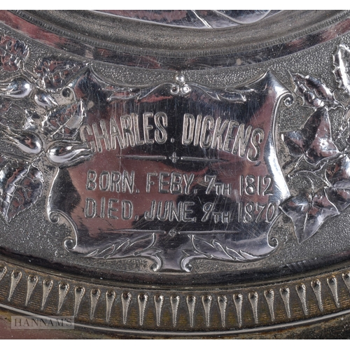 421 - A VICTORIAN SILVER PLATED CHARLES DICKENS PLAQUE. 30 cm x 24 cm.
