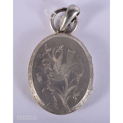 428 - A VICTORIAN WHITE METAL PENDANT. 14 grams. 4 cm x 3 cm.