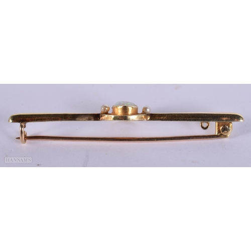436 - A VICTORIAN 15CT GOLD AND OPAL BROOCH. 3 grams. 5.5 cm wide.