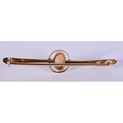 436 - A VICTORIAN 15CT GOLD AND OPAL BROOCH. 3 grams. 5.5 cm wide.