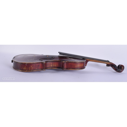 445 - A CASED VIOLIN with bow. Violin 57.5 cm long, length of back inc button 36.5 cm.