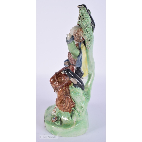 447 - A LARGE EARLY 19TH CENTURY STAFFORDSHIRE PEARLWARE FIGURE OF ELIJAH. 27 cm x 12 cm.