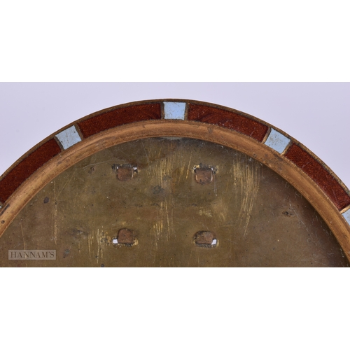 462 - AN ANTIQUE ENAMELLED GILT METAL PHOTOGRAPH FRAME. 12.5 cm x 9.5 cm.