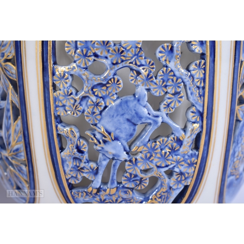 A RARE PAIR OF ROYAL WORCESTER PORCELAIN RETICULATED MONKEY VASES. 21 ...