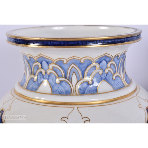 A RARE PAIR OF ROYAL WORCESTER PORCELAIN RETICULATED MONKEY VASES. 21 ...