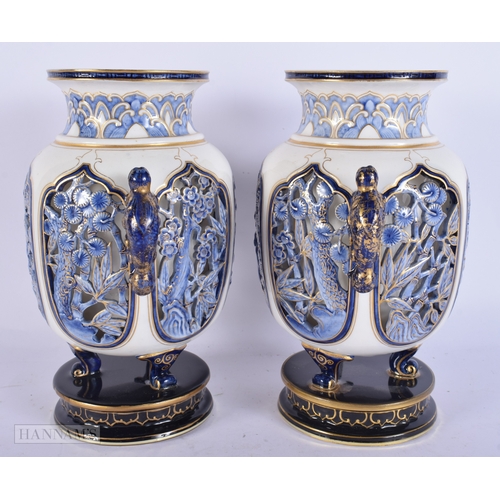 A RARE PAIR OF ROYAL WORCESTER PORCELAIN RETICULATED MONKEY VASES. 21 ...