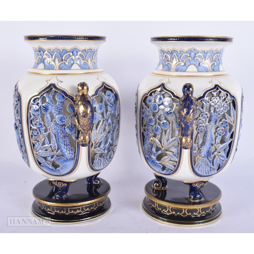 A RARE PAIR OF ROYAL WORCESTER PORCELAIN RETICULATED MONKEY VASES. 21 ...