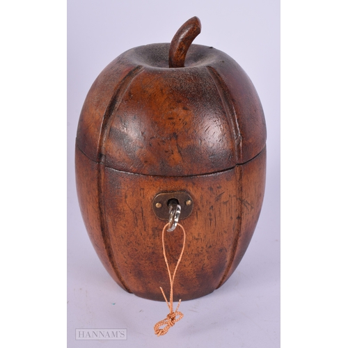 753 - A FRUITWOOD TEA CADDY. 19 cm high.