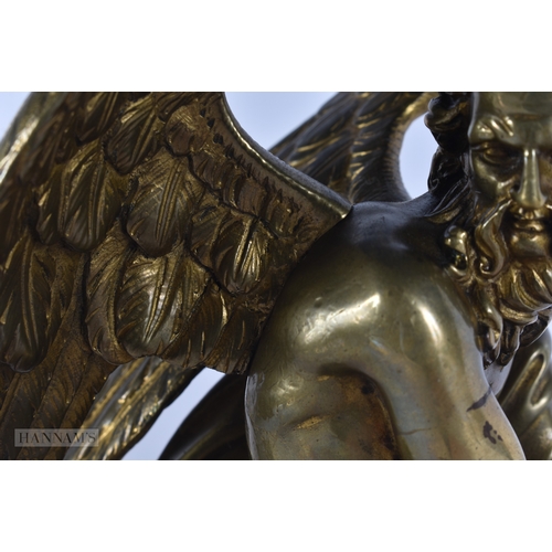 101 - A FINE EARLY 19TH CENTURY EUROPEAN GRAND TOUR GILT BRONZE FIGURE OF KRONOS modelled upon a red marbl... 