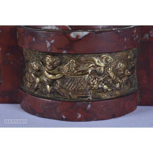 101 - A FINE EARLY 19TH CENTURY EUROPEAN GRAND TOUR GILT BRONZE FIGURE OF KRONOS modelled upon a red marbl... 