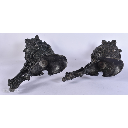 11 - A PAIR OF VICTORIAN CAST METAL CANDLESTICK HOLDERS together with a plated tankard. Largest 38 cm hig... 