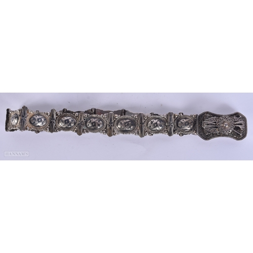114 - A 19TH CENTURY RUSSIAN SILVER NIELLO BELT decorated with motifs. 427 grams. 75 cm long.