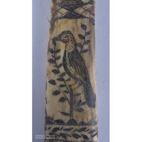 117 - A MID 19TH CENTURY SAILOR ENGRAVED SCRIMSHAW LAST engraved with birds, urns and flowers. 19cm long.