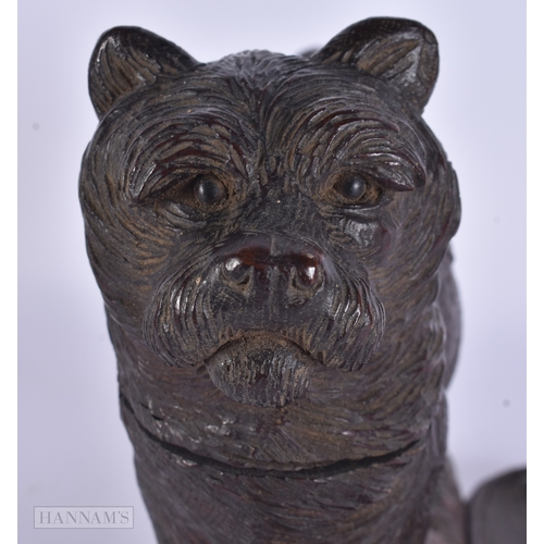 118 - A RARE AND LARGE 19TH CENTURY BAVARIAN BLACK FOREST CARVED WOOD INKWELL formed as a roaming dog, the... 