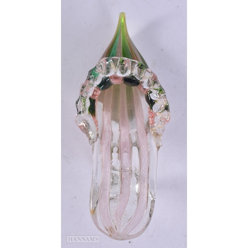 14 - AN UNUSUAL SPIRALLY MOULDED GLASS SHOE possibly Italian. 14.5 cm wide.