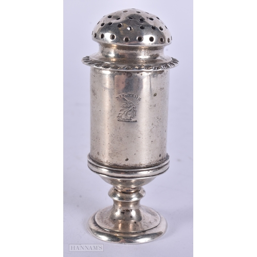 23 - AN 18TH CENTURY ARMORIAL SILVER PEPPER POT. 91 grams. 9.75 cm high.