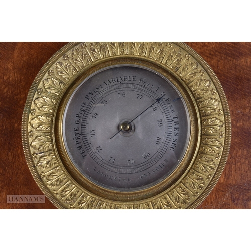 25 - A LATE 19TH CENTURY FRENCH GILT MOUNTED SILVERED DIAL BAROMETER. 14 cm x 12 cm.
