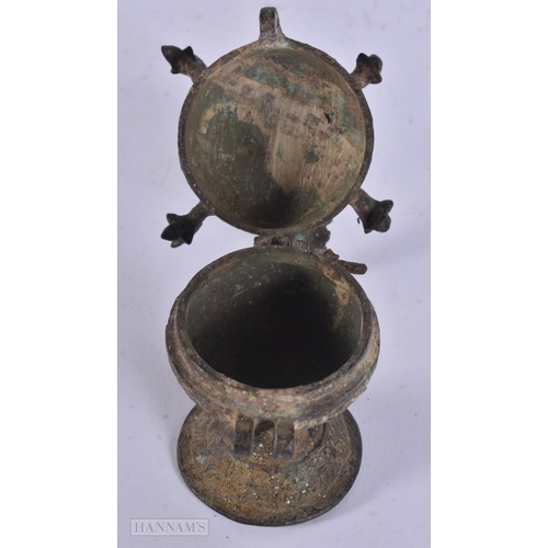 27 - A 14TH/15TH CENTURY ISLAMIC MIDDLE EASTERN BRONZE INCENSE BURNER AND COVER formed with numerous bird... 