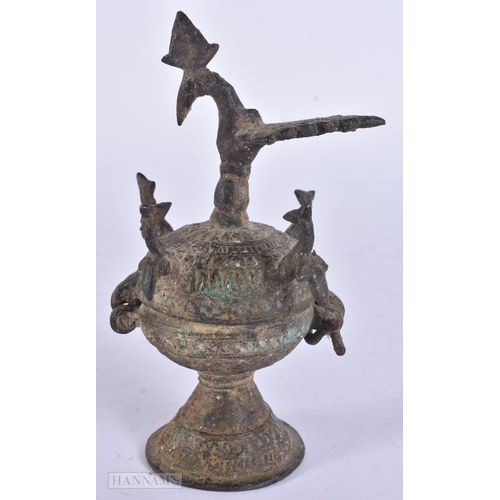27 - A 14TH/15TH CENTURY ISLAMIC MIDDLE EASTERN BRONZE INCENSE BURNER AND COVER formed with numerous bird... 