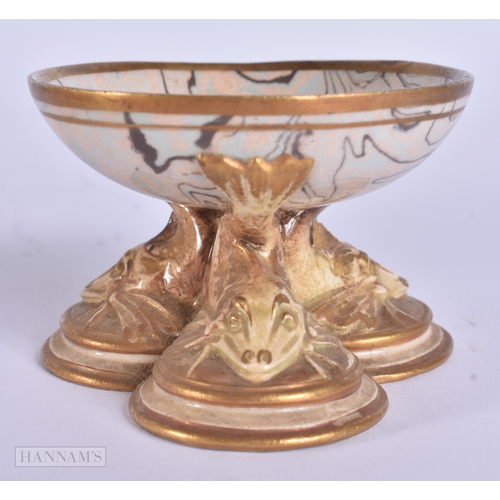 34 - AN UNUSUAL AESTHETIC MOVEMENT SILVER MOUNTED DOULTON BEAKER together with a Doulton Lambeth dolphin ... 