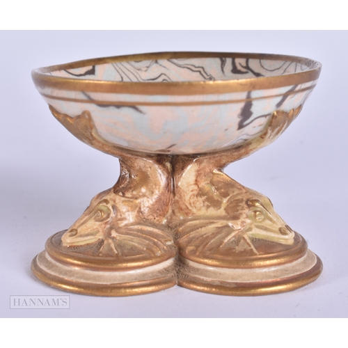 34 - AN UNUSUAL AESTHETIC MOVEMENT SILVER MOUNTED DOULTON BEAKER together with a Doulton Lambeth dolphin ... 
