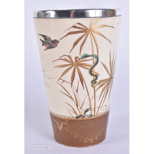 34 - AN UNUSUAL AESTHETIC MOVEMENT SILVER MOUNTED DOULTON BEAKER together with a Doulton Lambeth dolphin ... 
