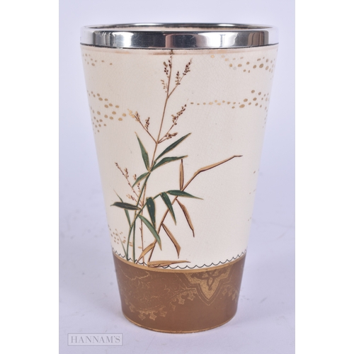 34 - AN UNUSUAL AESTHETIC MOVEMENT SILVER MOUNTED DOULTON BEAKER together with a Doulton Lambeth dolphin ... 