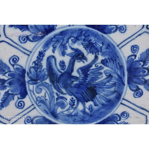35 - A RARE 18TH CENTURY DELFT BLUE AND WHITE POTTERY PLATE modelled in the Chinese Ming style. 25 cm dia... 
