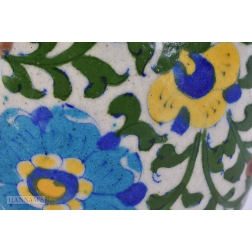 48 - A LARGE MIDDLE EASTERN IZNIK PERSIAN ISLAMIC FAIENCE VASE. 29 cm high.
