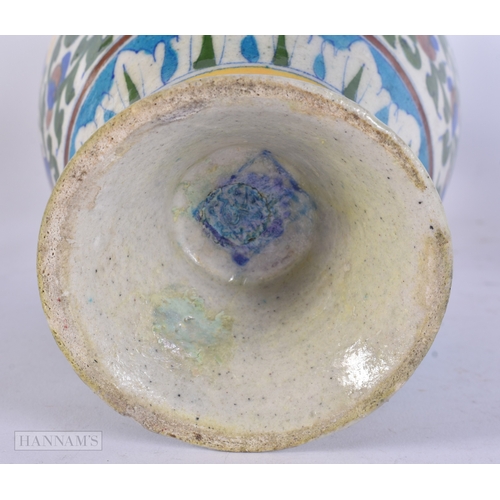 48 - A LARGE MIDDLE EASTERN IZNIK PERSIAN ISLAMIC FAIENCE VASE. 29 cm high.