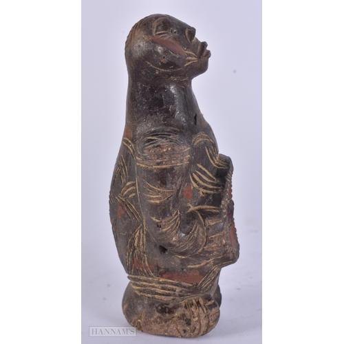 52 - AN UNUSUAL ANTIQUE TRIBAL PAINTED POTTERY FERTILITY FIGURE. 14 cm high.