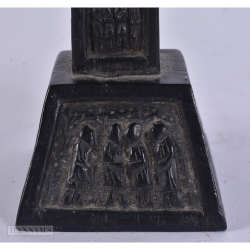 53 - AN EARLY IRISH CARVED BOG OAK CRUCIFIX. 21 cm high.