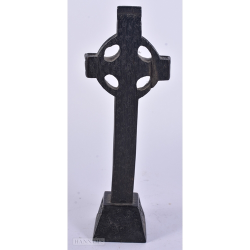 53 - AN EARLY IRISH CARVED BOG OAK CRUCIFIX. 21 cm high.