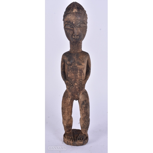 54 - TWO AFRICAN TRIBAL CARVED WOOD FIGURES. Largest 59 cm long inc material. (2)