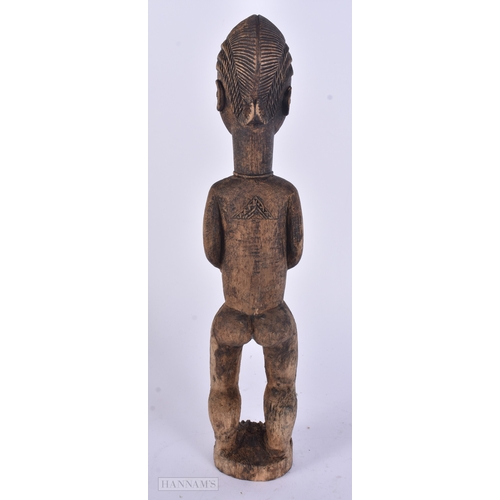 54 - TWO AFRICAN TRIBAL CARVED WOOD FIGURES. Largest 59 cm long inc material. (2)