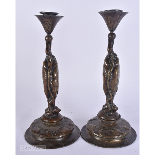 57 - Auguste Nicolas Cain (19th Century) Pair, Bronze bird candlesticks. 25 cm high.