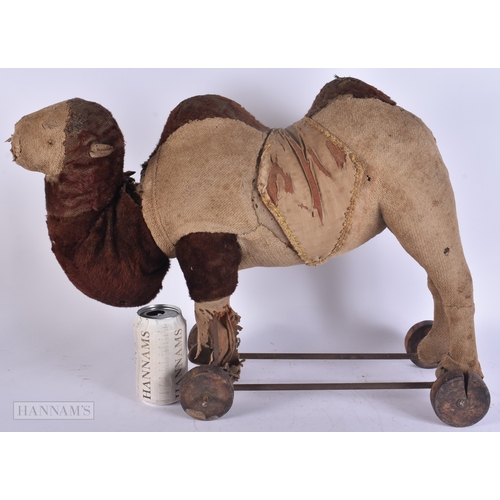 61 - A LARGE ANTIQUE CAMEL TOY possibly Steiff. 50 cm x 40 cm.
