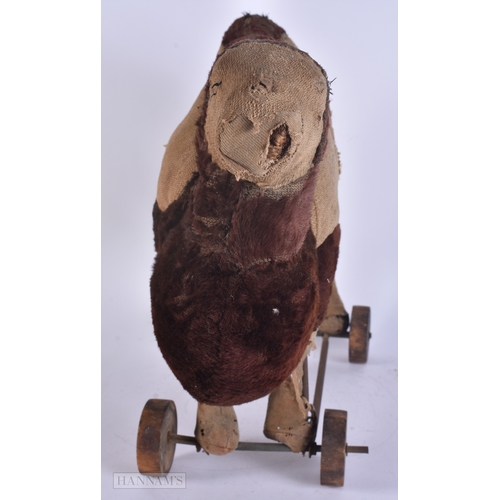 61 - A LARGE ANTIQUE CAMEL TOY possibly Steiff. 50 cm x 40 cm.