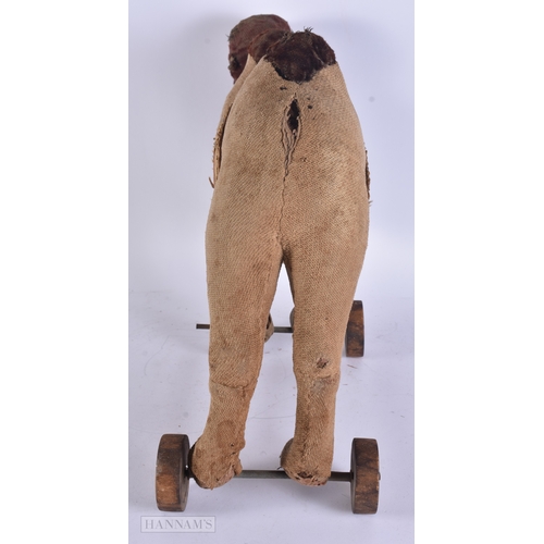 61 - A LARGE ANTIQUE CAMEL TOY possibly Steiff. 50 cm x 40 cm.