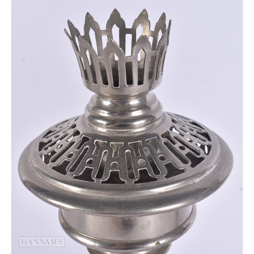 63 - AN UNUSUAL ANTIQUE TIN CASED SILVER PLATED CAMPAIGN TRAVELLING OIL LAMPS. Case 55 cm x 27 cm.