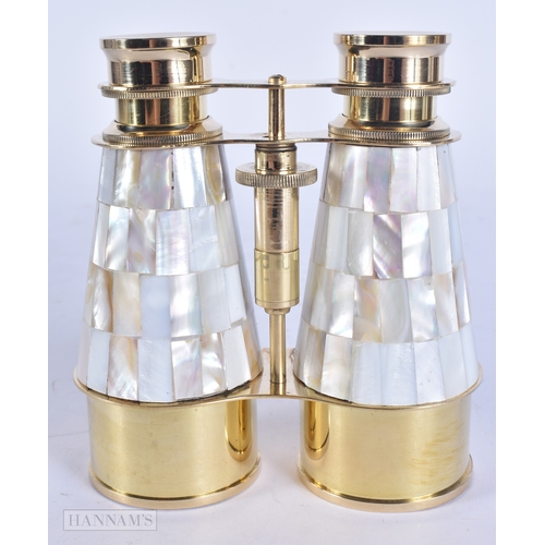 71 - A PAIR OF OVERSIZED MOTHER OF PEARL OPERA GLASSES. 14 cm x 10 cm extended.
