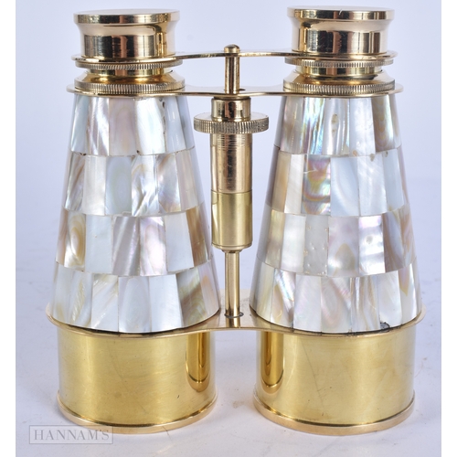 77 - A PAIR OF OVERSIZED MOTHER OF PEARL OPERA GLASSES. 14 cm x 10 cm extended.