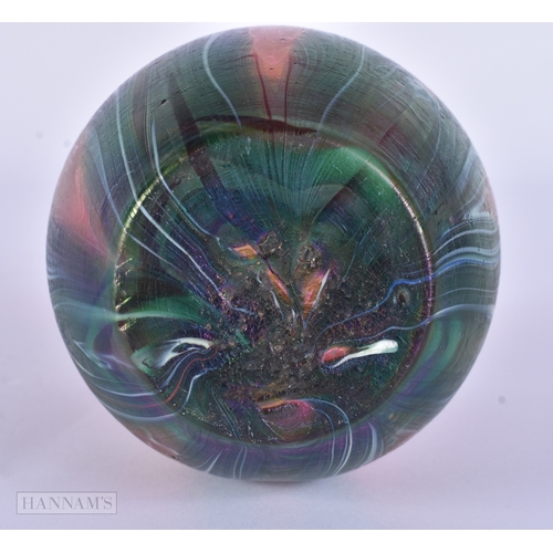 81 - AN IRIDESCENT GLASS PEACOCK FEATHER SWIRL VASE. 10.5 cm x 8.5 cm.