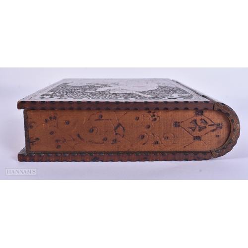 82 - AN UNUSUAL ANTIQUE CONTINENTAL CHINOISERIE POLKA WORK HIDDEN STORAGE BOOK BOX. 23 cm x 17 cm.