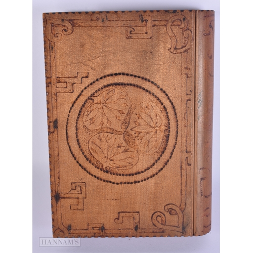 82 - AN UNUSUAL ANTIQUE CONTINENTAL CHINOISERIE POLKA WORK HIDDEN STORAGE BOOK BOX. 23 cm x 17 cm.