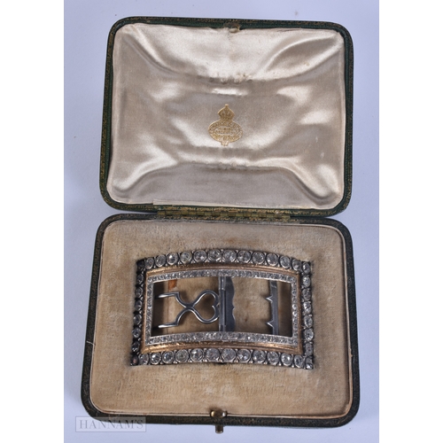 83 - A LOVELY EARLY 19TH CENTURY PASTE SET BELT BUCKLE within fitted leather case. 8.5 cm x 5.25 cm.