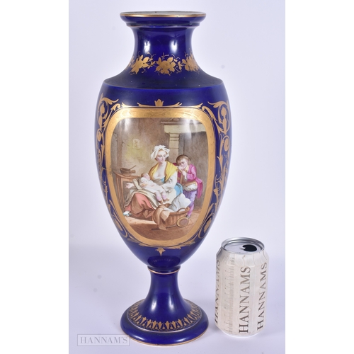 84 - A LARGE 19TH CENTURY FRENCH SEVRES STYLE PORCELAIN VASE painted with figures in an interior. 39 cm h... 