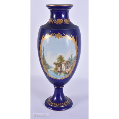 84 - A LARGE 19TH CENTURY FRENCH SEVRES STYLE PORCELAIN VASE painted with figures in an interior. 39 cm h... 
