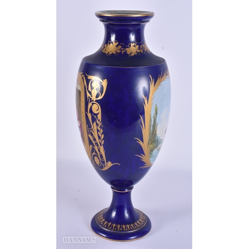 84 - A LARGE 19TH CENTURY FRENCH SEVRES STYLE PORCELAIN VASE painted with figures in an interior. 39 cm h... 