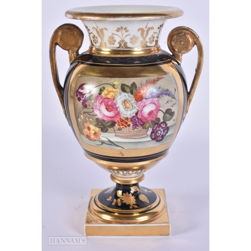 85 - AN EARLY 19TH CENTURY ENGLISH PORCELAIN TWIN HANDLED VASE unusually painted with a still life on a g... 